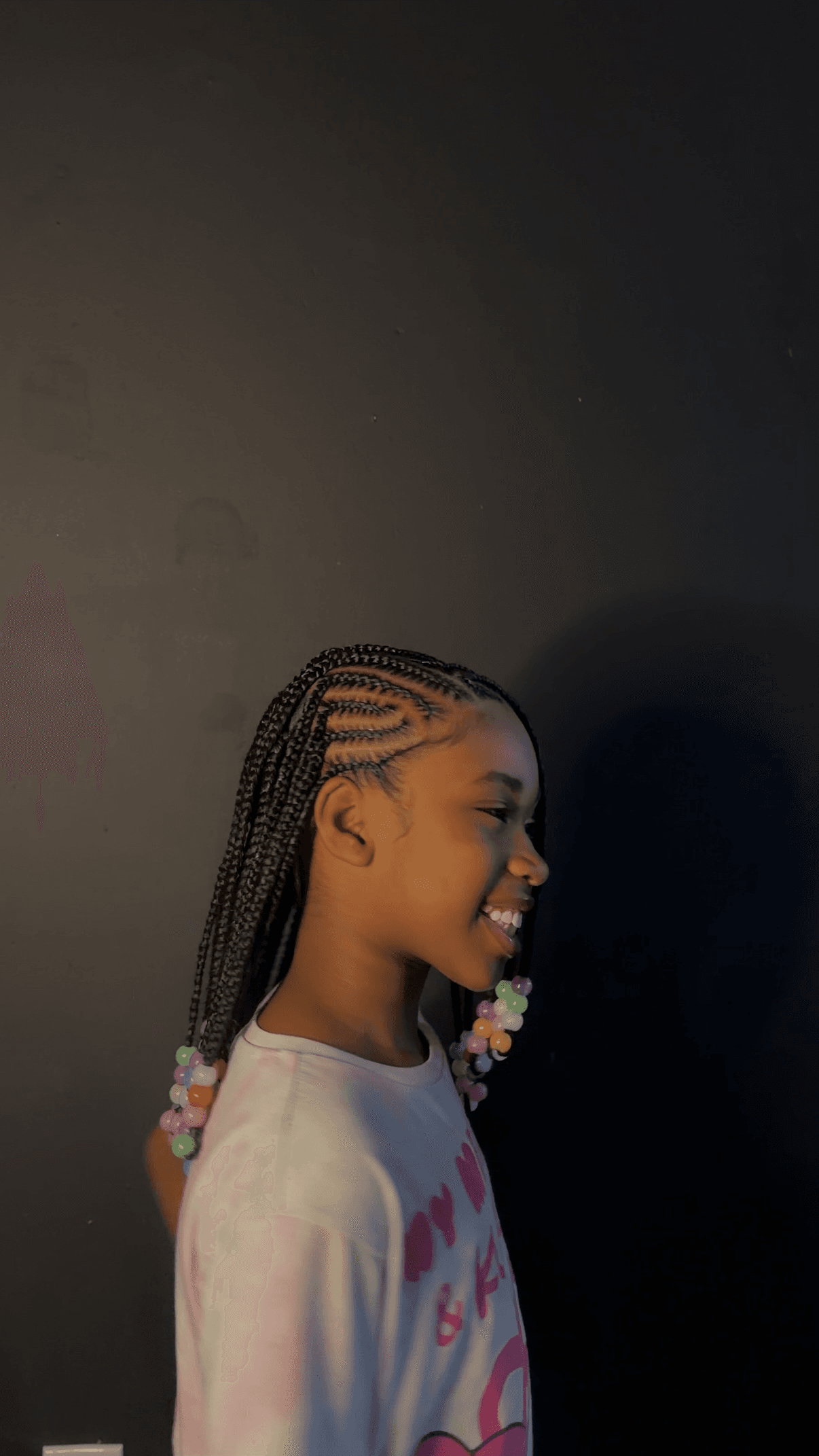 Kids braids with beads styled by Iriee Beauty